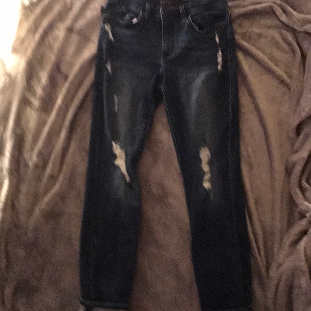 Dark blue ripped jeans